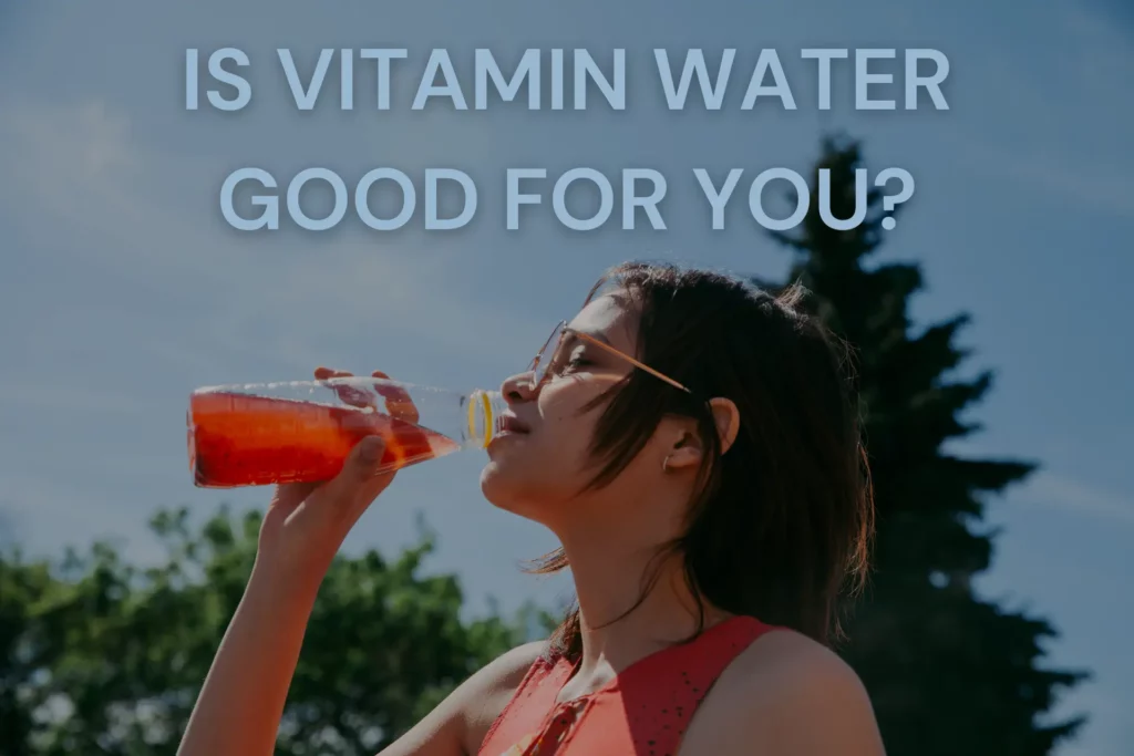 A woman sips on vitamin water